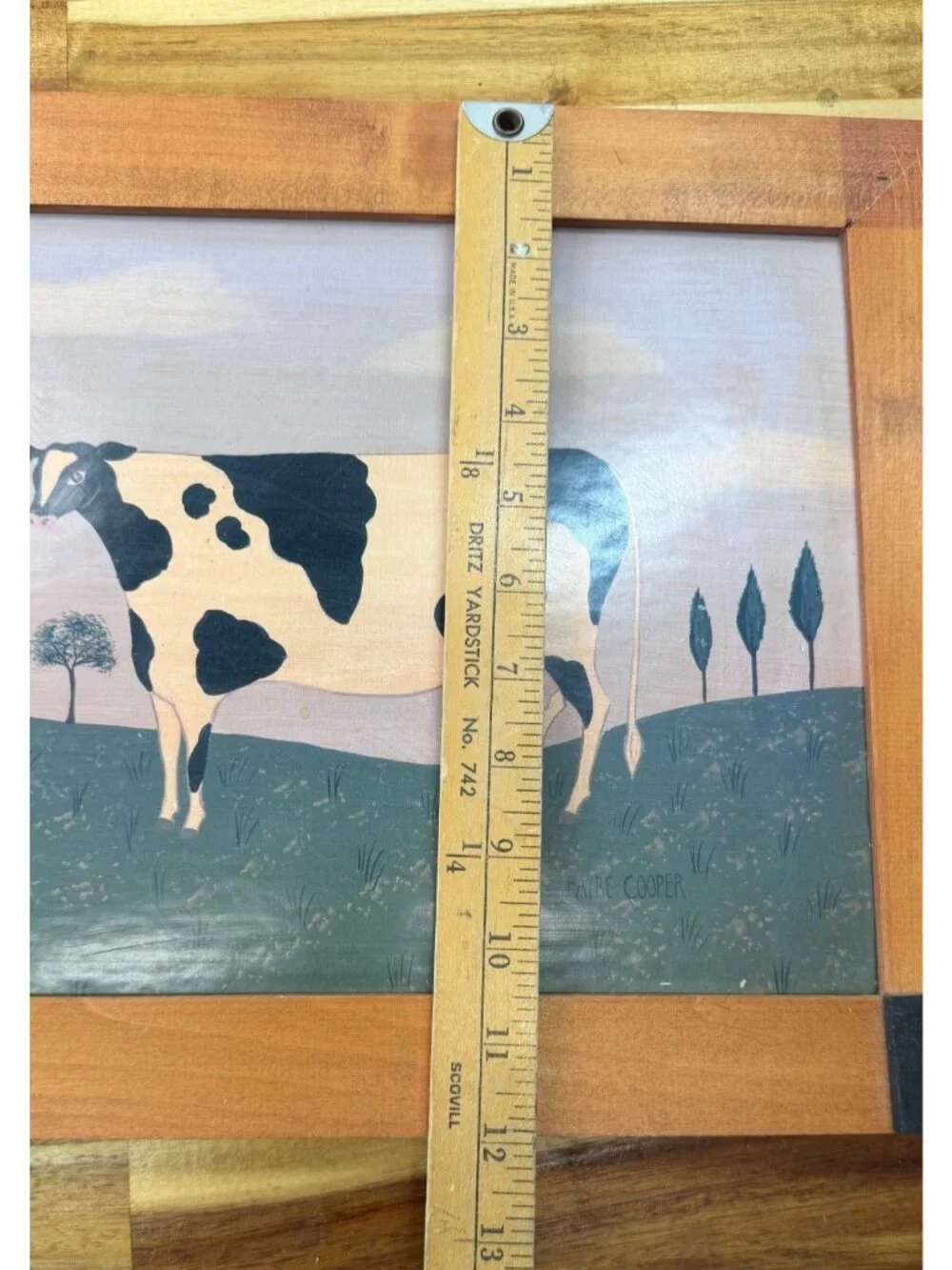 Framed folk art print, American rural scene, Holstein cow